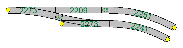 Een paar slanke K-rail wissels met enkele passtukjes om een parallelafstand van 64 mm te bereiken.png